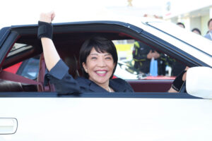 Then Minister Sanae Takaichi and her favorite car, a Toyota Supra