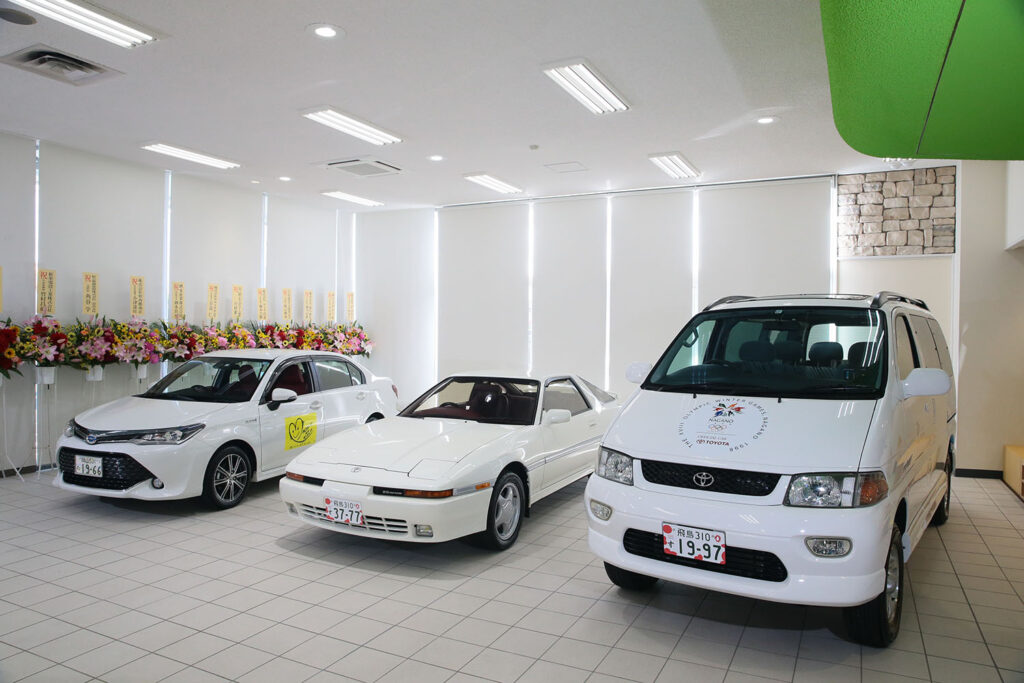 Then Minister Sanae Takaichi and her favorite car, a Toyota Supra