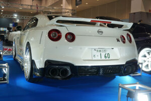 Two Nissan GT-Rs displayed by PHOENIX's POWER at Osaka Auto Messe 2024