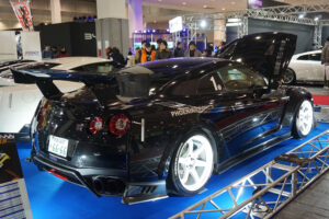 Two Nissan GT-Rs displayed by PHOENIX's POWER at Osaka Auto Messe 2024