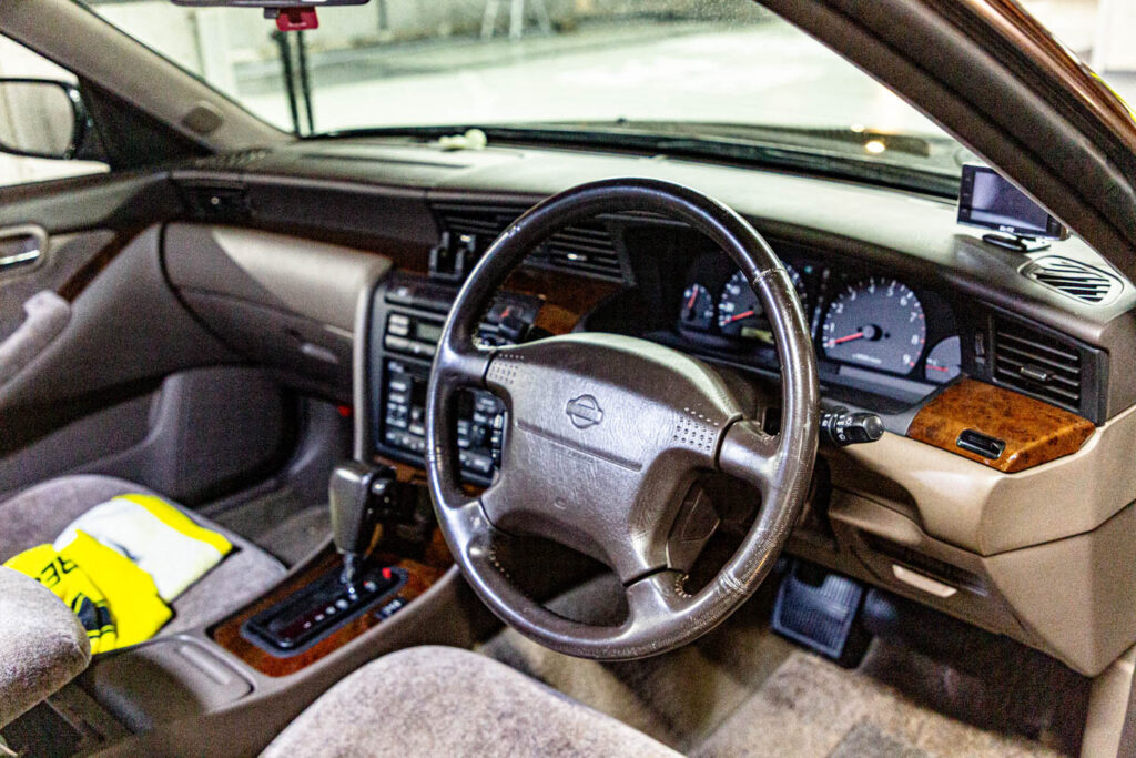 A 1998 Nissan Laurel Medalist and its owner, Mai Yazawa