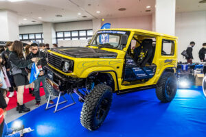 Current model Suzuki Jimny on display at the Showa Garage booth at Osaka Auto Messe 2024