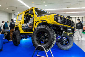 Current model Suzuki Jimny on display at the Showa Garage booth at Osaka Auto Messe 2024