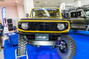 Current model Suzuki Jimny on display at the Showa Garage booth at Osaka Auto Messe 2024