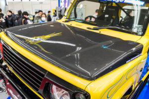 Current model Suzuki Jimny on display at the Showa Garage booth at Osaka Auto Messe 2024