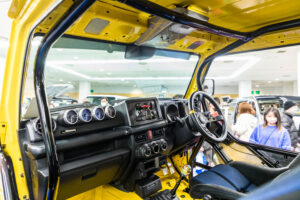 Current model Suzuki Jimny on display at the Showa Garage booth at Osaka Auto Messe 2024