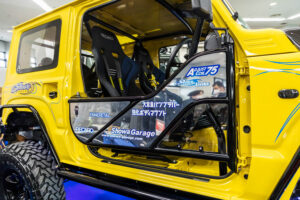 Current model Suzuki Jimny on display at the Showa Garage booth at Osaka Auto Messe 2024