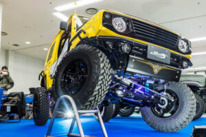 Current model Suzuki Jimny on display at the Showa Garage booth at Osaka Auto Messe 2024