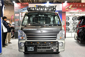 Suzuki Carry demo car on display at the Weds booth at Osaka Auto Messe 2024