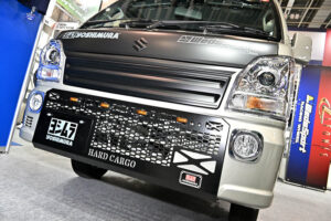 Suzuki Carry demo car on display at the Weds booth at Osaka Auto Messe 2024