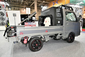 Suzuki Carry demo car on display at the Weds booth at Osaka Auto Messe 2024