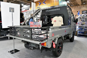 Suzuki Carry demo car on display at the Weds booth at Osaka Auto Messe 2024