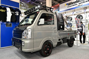 Suzuki Carry demo car on display at the Weds booth at Osaka Auto Messe 2024