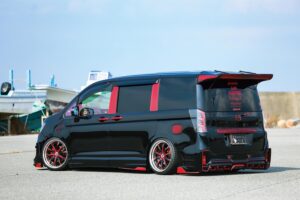 The Honda STEPWGN, with its flashy black and red body