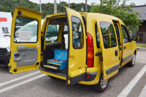 2006 Renault first generation “Kangoo” and a Bridgestone Moped Champion Deluxe